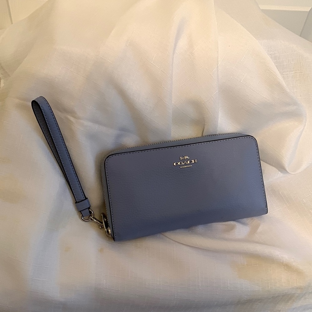 Coach light blue soft pebble wallet with wrist strap. Zipper closure,